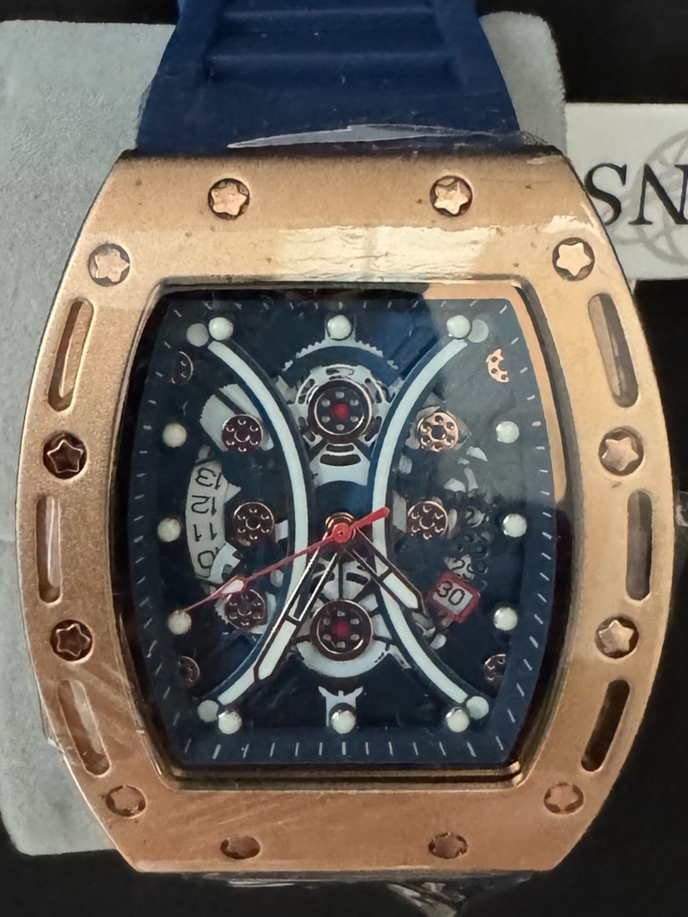 Priced to sell - Men's Rose Gold-Tone Skeleton Watch with Blue Strap